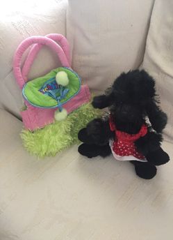 Webkinz poodle dog black with dress on it and purse to carry it in