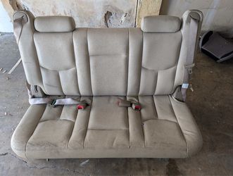 Back row ford or Suv or yukon Chevy tahoe