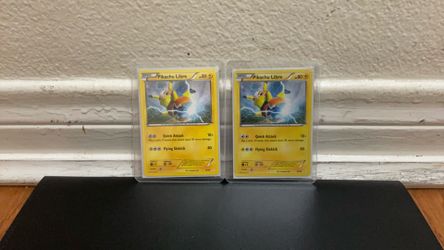 2 pikachu libres one holo and non holo