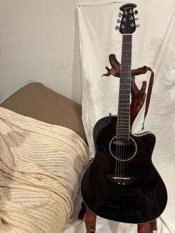2011 Ovation celebrity  GC 057M, mid depth acoustic/ elec guitar  with hard case Road runner case