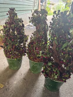 artificial holiday berry & twig cone topiaries set in green embossed ceramic pots