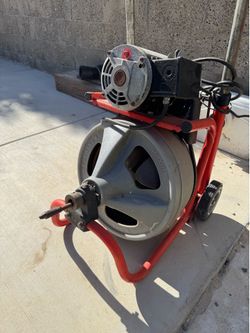 Rigid drain cleaner, drum machine, snake, auger