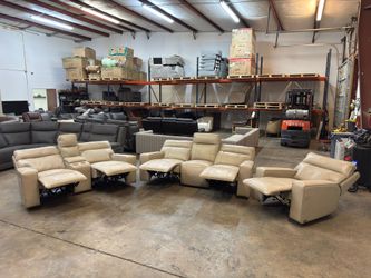 Real leather power recliner set. sofa, loveseat and chair.
