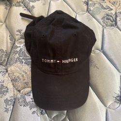 Black Tommy Hilfiger Cap. Leather Strap.