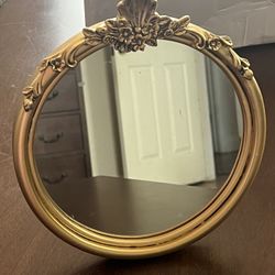 A very nice Gold antique looking mirror asking 10 I paid 20