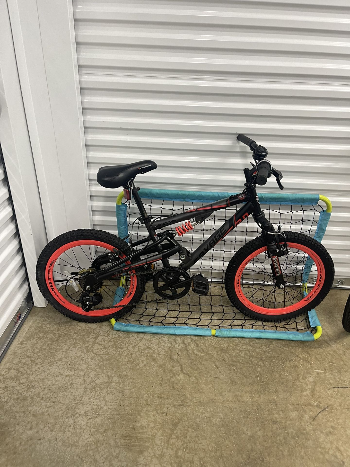Boys Bike And Goal Post