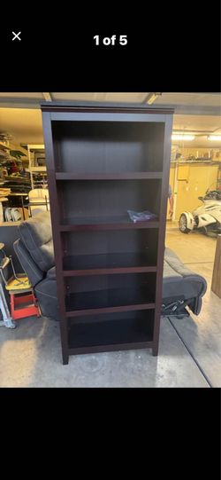 Dark brown bookshelf $45 Gilbert and Ray rd. Check all pics and offers.