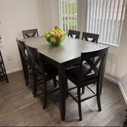 Counter Height Dining Table and 6 Bar Stool Chairs Ashley Furniture Caitbrook