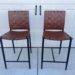 TWO BROWN WOVEN BARSTOOLS