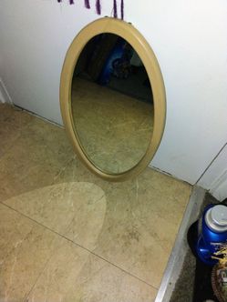 24" H. 13" W. Wooden framed mirror pickup only cash