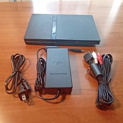 PlayStation 2 Sony PS2 Slim Console Bundle Two Remote Controllers And A Couple Games And A Memory Card 