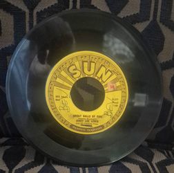 Jerry Lee Lewis, great balls of fire oringinal sun label 45 ( its warped on one edge ) so a shelf filler