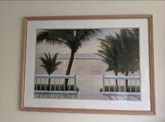 Framed Coastal Scene behind glass