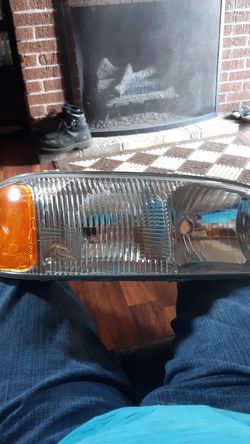 2003 GMC headlight passenger side