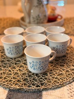 Set of 7 White Ceramic Cups with Blue Floral Pattern