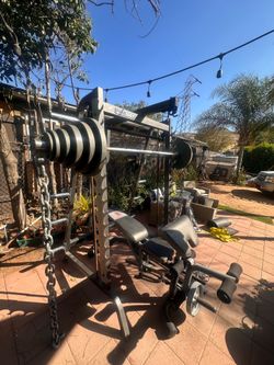 PARABODY OLYMPIC SQUAT RACK SMITH MACHINE WITH OLYMPIC WEIGHTS AND BENCH