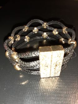 Black and brass bracelet