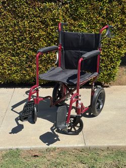 Transport wheelchair
