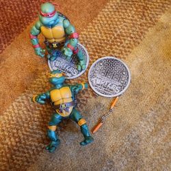 2 Teenage Ninja Turtles Raphael And Michaelangelo. Only Weapon Is One Nunjuck. Modern Reyro Release. Rare