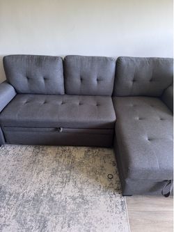 Couch Barely used (Price Negotiable)