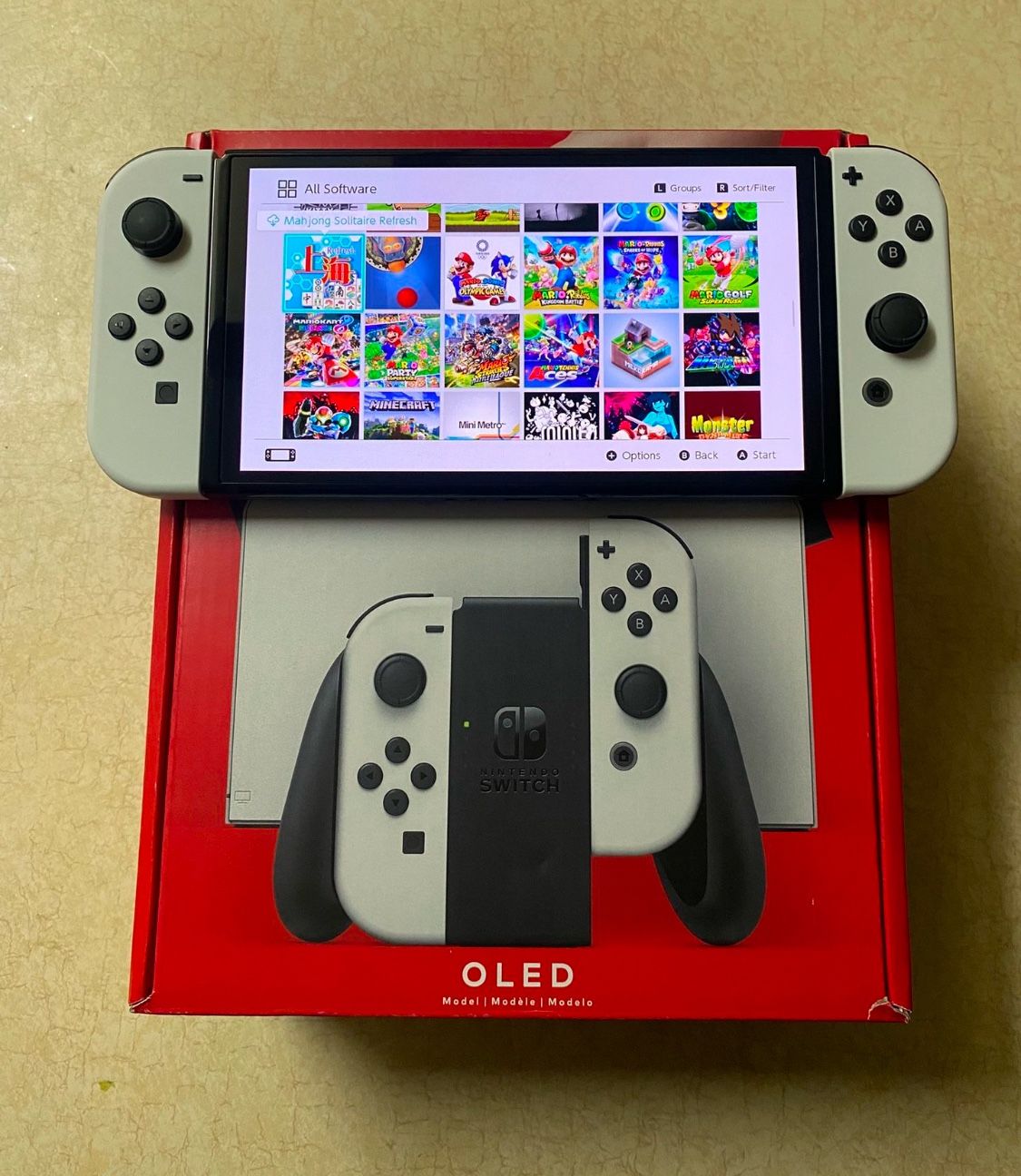 NINTENDO SWITCH OLED with 125 SWITCH GAMES and 7500 CLASSIC GAMES From NES,SNES,GAMEBOY,ATARI,SEGA,GENESSIS and More