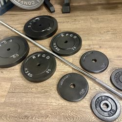 BRAND NEW:  7 ft Standard Bar With VINTAGE Cast Iron Weight Plates: 50s,25s, 10s,  And 5s. (Total: 205 lbs)  