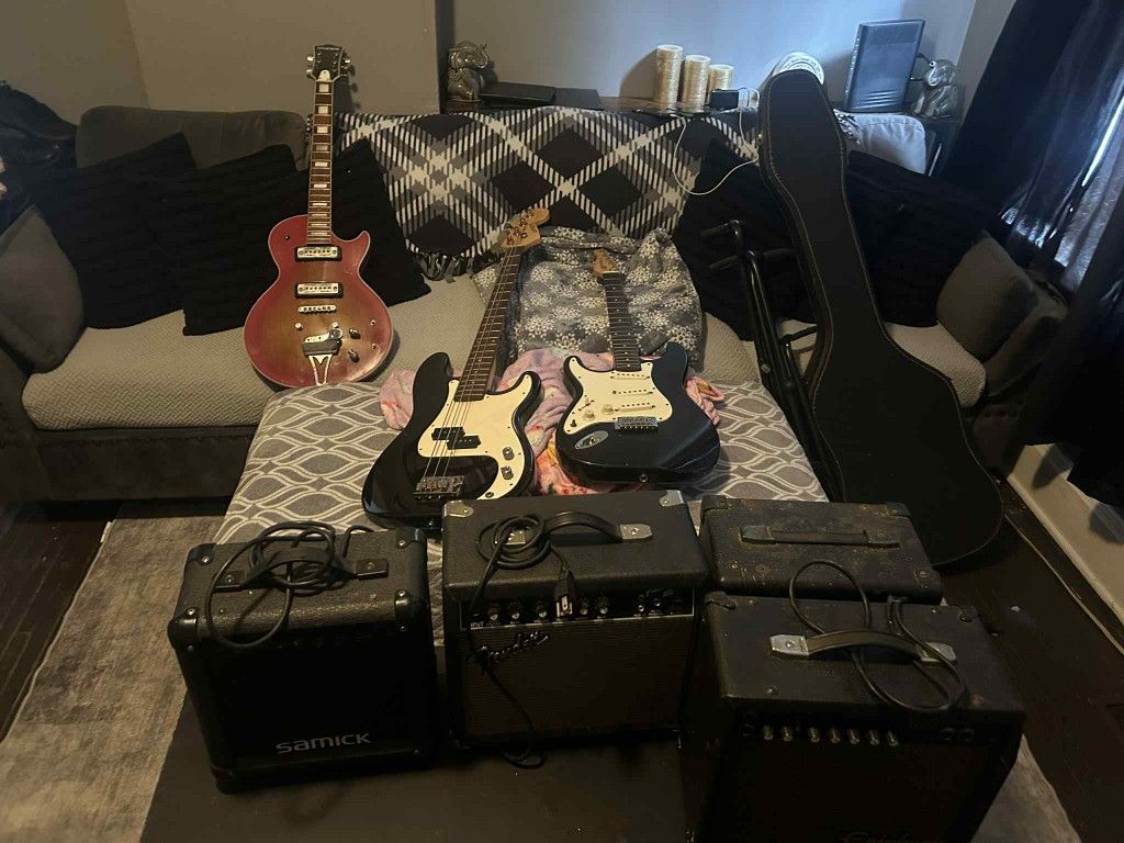 Electric Guitars And stands And Amps 
