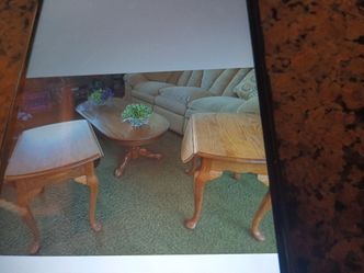 Two oak n tables , one coffee table , the n tables dropped down either could be round or square