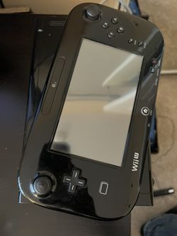 Nintendo Wii U gaming system plus accessories and 17 games
