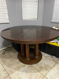 Circle table with two leafs