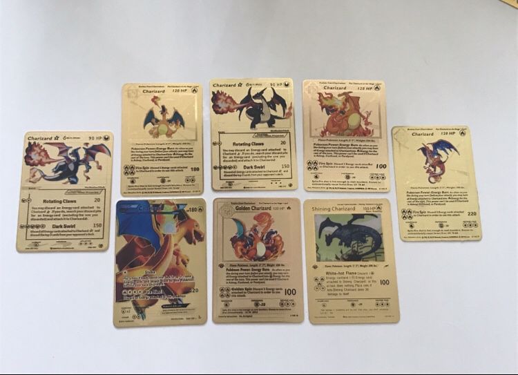 8x Charizard gold metal pokemon cards
