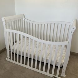 Spotless Convertible crib/toddler bed and mattress