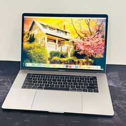 Apple MacBook Pro 2019 15” TouchBar 2.6Ghz 6-CORE i7 16GB 256GB Radeon Pro 555X 4GB VRAM Graphics