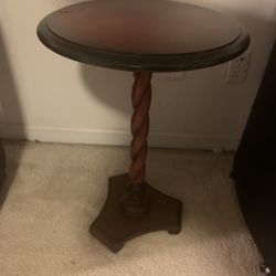 Round Wooden Table With Braided Design On Stand