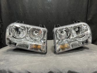 Brand new 2008 2009 2010 Chrysler 300 OEM Genuine Halogen Headlights LH & RH OE# 57 01 07 57AA & 57 01 07 56AA