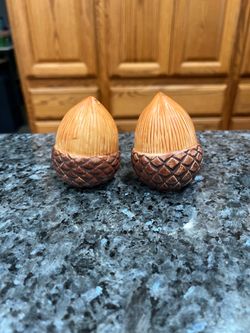 Vintage Ceramic Acorn Pair of Salt and Pepper Shakers.  Size approximately 2 1/2 inches tall.  Preowned never used.  .  Has been on display in a cabin