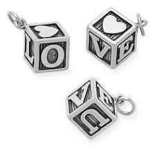 retired James Avery sterling silver wooden block charm featuring the word "LOVE"