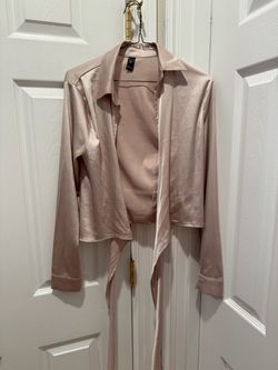 Beautiful woman’s/juniors satin blouse