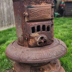 Antique Round Oak Pot Belly Stove