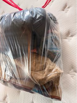 Bag full of clothes and Michael Kors bag