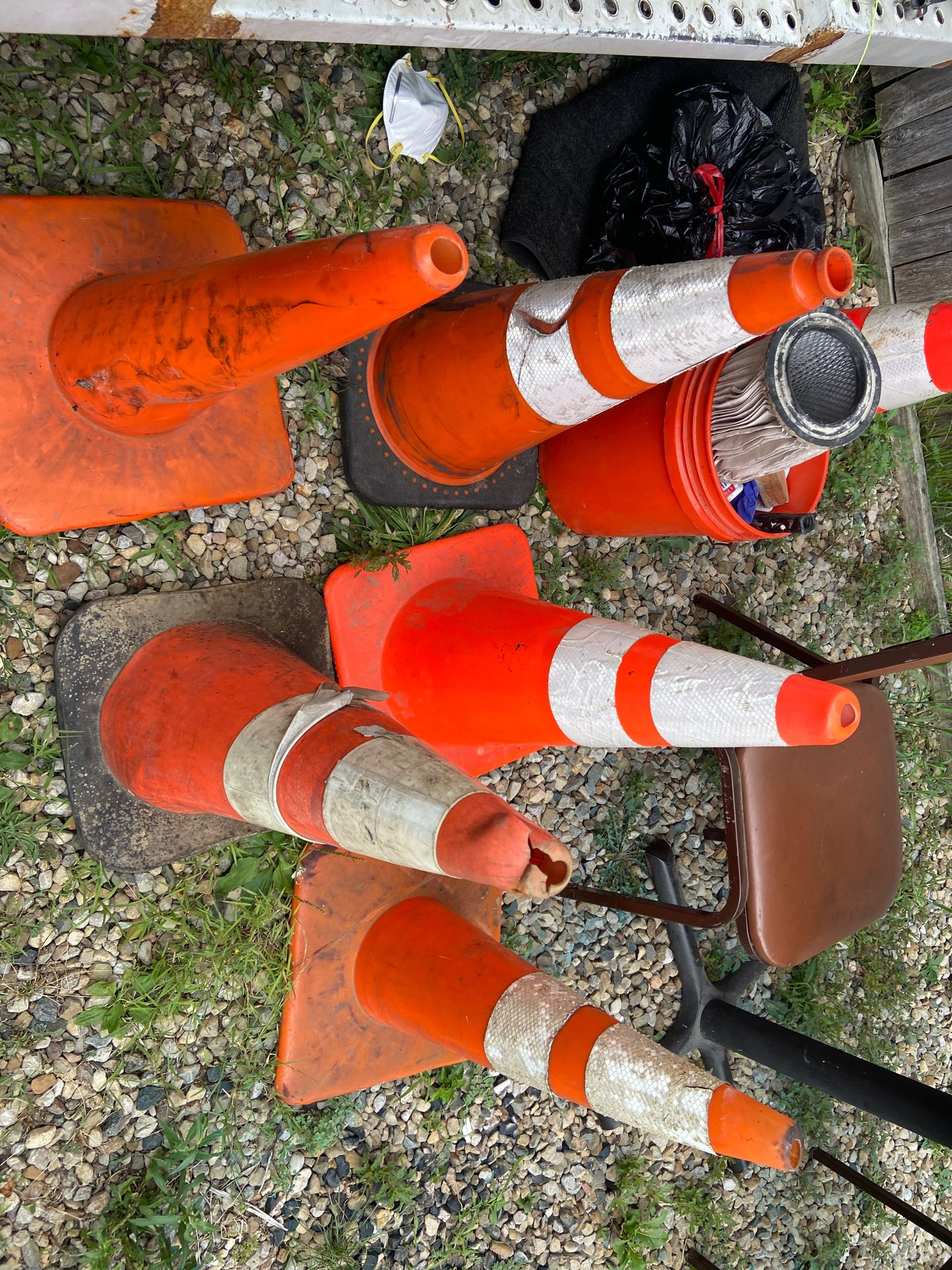 Five tall driver training cones