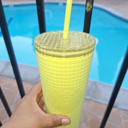 Starbucks Meadow Yellow Grid Soft Touch Venti 24 oz Tumbler is a bright yellow