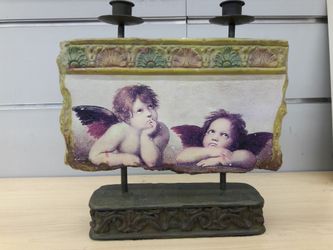 Cherub candle holder 8 inches wide by 9 inches height