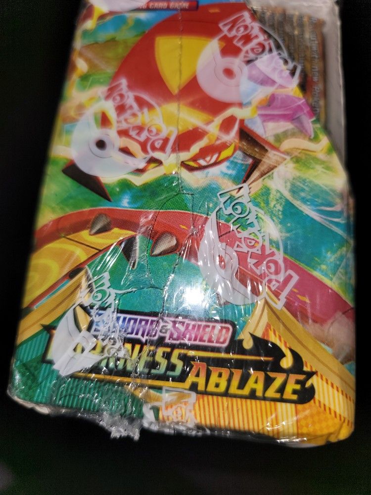 fake darkness ablaze booster box Bought darkness ablaze booster box off Amazon and it contained an amazing  rare jirachi and has the rebel clash print on the back of the packs lmao  must be fake right? : main image 0