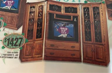 Entertainment center  with 2 cabinets all 3 pieces have wheels solid golden oak