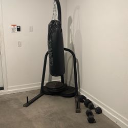 Punching Bag And Stand With Miscellaneous Weights. 