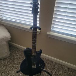 Electric guitar with the Amp and wires 