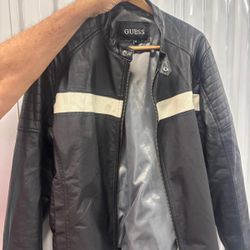 Guess black leather men’s waist jacket extra large with a white stripe. $50