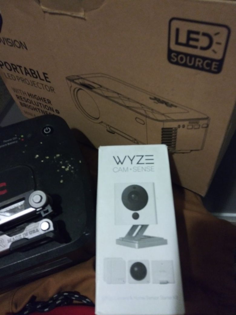 Wyze camera and a mini portable projector