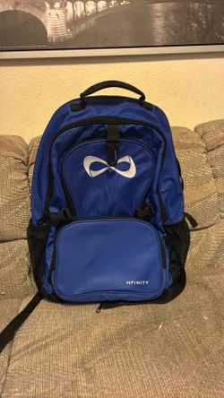 Backpack blue five pockets for school or trips only used one time￼